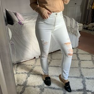 White distressed and ripped high waisted jeans